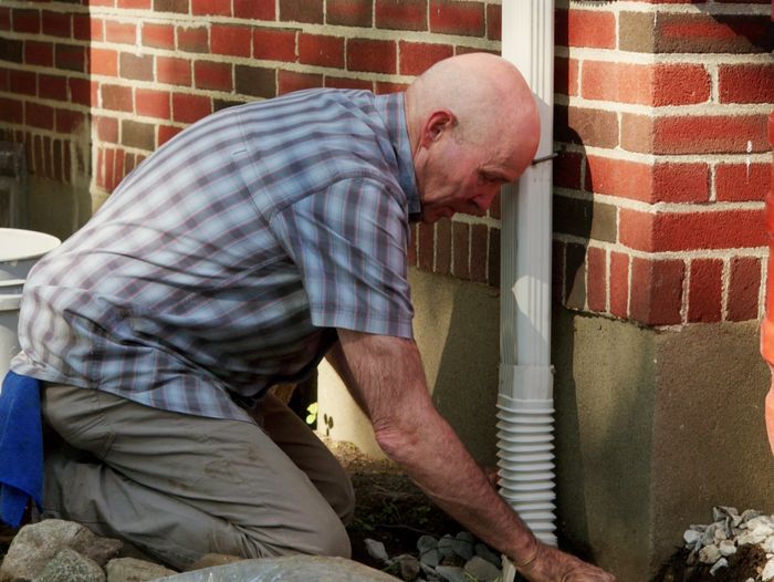 S22 E20: Mark McCullough installs a downspout extension for a flagstone patio