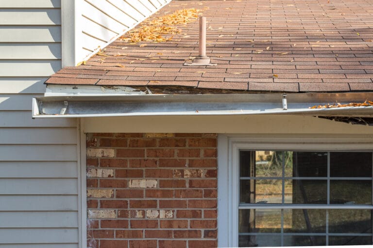 The facia board is rotted and the gutters a re falling away from the house.